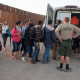 Central American asylum seekers are detained by the U.S. Border Patrol after they crossed into the  United States from Mexico near Yuma, Ariz.