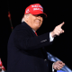 US President Donald Trump gestures during a rally at Southern Wisconsin Regional Airport in Janesville, Wisconsin on October 17, 2020.