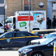 NYPD officers search a crashed U-Haul truck on Hamilton Avenue in Brooklyn, N.Y
