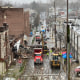 Emergency responders and heavy equipment are seen at the site of a deadly explosion at a chocolate factory Saturday  in West Reading, Pennsylvania.