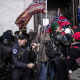 Demonstrators clash with U.S. Capitol police officers while trying to enter the Capitol building during a protest on Jan. 6, 2021.