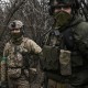 Ukrainian special unit members stands in the woods, near Bachmut, in the region of Donbas, on March 15, 2023. 