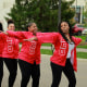 Members of Delta Sigma Theta sorority dance during the Indiana University Homecoming Parade in Bloomington, Ind.