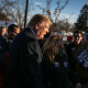 Republican presidential candidate Donald Trump greets people as he visits a polling station as voters cast their primary day ballots on Feb. 9, 2016 in Manchester, N.H.