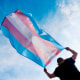 young person with a transgender pride flag