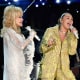 Dolly Parton, left, and Miley Cyrus perform during the 61st Annual GRAMMY Awards in Los Angeles