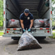Alexander Shaw of T&C Movers loads garbage into a U-Haul truck in Jackson, Miss., on April 5, 2023.Syndication: The Clarion-Ledger