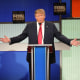 From left, Marco Rubio, Donald Trump and Ted Cruz  participate in a presidential debate in North Charleston, S.C.,