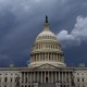 Storm clouds over a wide shot of the Capitol building.