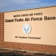 An installation sign is displayed at the main gate of Grand Forks Air Force Base, North Dakota Oct. 31, 2019. Grand Forks AFB is home to the 319th Reconnaissance Wing which provides high-altitude intelligence, surveillance, and reconnaissance to the United States Air Force. (U.S. Air Force photo by Airman 1st Class Brody Katka)