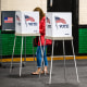  A voter casts their ballot in the Kentucky Primary Elections at polling place in the Simpsonville Community Gym on May 16, 2023 in Simpsonville, Ky.