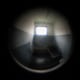 Photo Illustration: A view through a fisheye lens of an empty solitary confinement prison cell