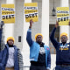 Cody Hounanian, executive director at the Student Debt Crisis Center, in a sweatshirt with the amount he owed in student loans during a protest in support of student debt cancellation as the Supreme Court begins oral arguments on Feb. 28, 2023.