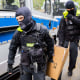 Prosecutors in Germany say authorities have raided 15 properties across the country and seized assets in an investigation into the financing of protests by the Last Generation climate activist group. (Christoph Soeder/dpa via AP)