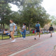 Students walk along a footpath at the University of Florida campus in Gainesville.