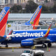 Southwest Airlines Co. planes stand on the tarmac at San Francisco International Airport (SFO) in San Francisco, California, U.S., on Friday, Jan. 19, 2018. Southwest Airlines Co. is scheduled to release earnings on January 25. Photographer: David Paul Morris/Bloomberg via Getty Images