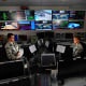 Staff Sgt. Alex Garviria and 2nd Lt. Rachel James work in the Global Strategic Warning and Space Surveillance System Center Sept. 2, 2014, at Cheyenne Mountain Air Force Station, Colo. Garviria is a 721st CS senior systems controller and James is the 721s