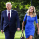 Then-President Donald Trump and White House Press Secretary Kayleigh McEnany walk toward members of the press prior to Trump’s departure from the White House on Sept. 15, 2020.