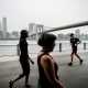 Image: People walk through a Brooklyn Park on a hazy morning resulting from Canadian wildfires, on June 6, 2023 in New York .