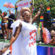 MIAMI BEACH, FL - APR 16: Celebrated drag personality and Palace ambassador Tiffany Fantasia co-hosts the 15th annual Miami Beach Pride Parade wearing a custom dress that declares, "Drag is not a crime" on Sunday, April 16, 2023 in Miami Beach, Florida.