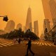 Image: Pedestrians pass the One World Trade Center, center,  amidst a smokey haze from wildfires in Canada, on June 7, 2023, in New York.