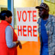 Voters exit a polling station in Camden, Ala., on March 3, 2020.