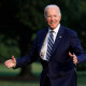 President Joe Biden walks across the South Lawn back to the White House after returning from a day trip to Chicago on June 28, 2023.