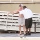 Two men discuss the location of a boat at the Montgomery Riverfront, Alabama, on Aug. 5, 2023.