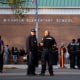 Police respond to a shooting that injured a teacher at Richneck Elementary