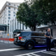 Image: A Fulton County Sheriff officer blocks off a street in front of the Fulton County Courthouse on Aug. 14, 2023 in Atlanta.