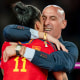 Luis Rubiales, president of the Spanish soccer federation, hugs Spanish soccer star Jenni Hermoso after the Women's World Cup Final in Sydney on Aug. 20, 2023.