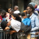 Asylum seekers spend another day on the sidewalk outside of the Roosevelt Hotel in Midtown Manhattan New York City, NY August 1, 2023. The hotel which has been an intake processing center for migrants seeking asylum are completely full to capacity.