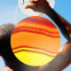 Photo illustration of a man pouring a gallon of water over his head and a melting sun.