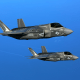 Two F-35B fighter Jets during aerial refueling training over the Atlantic Ocean