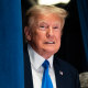 Former President Donald Trump prepares to speak at an event