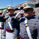 U.S. Military Academy graduating cadets salute at a commencement ceremony