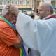 Married and same-sex couples take part in a public blessing ceremony in front of the Cologne Cathedral in Germany on Sept. 20, 2023.