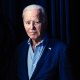 President Joe Biden waits to walk on stage