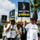 Striking WGA and SAG-AFTRA members outside Paramount Studios in Los Angeles on Sept. 18, 2023.