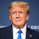 Former President Donald Trump stands on stage before speaking at a Concerned Women for America Summit at the Capitol Hilton, Friday, Sept. 15, 2023, in Washington.