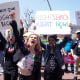 FILE - Supporters cheer up as Vice President Kamala Harris gives remarks at the Women's March in Los Angeles Saturday, April 15, 2023. One year ago, the U.S. Supreme Court rescinded a five-decade-old right to abortion, prompting a seismic shift in debates about politics, values, freedom and fairness.