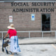 A woman walks to a Social Security office in Houston on July 13, 2022.