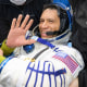 Frank Rubio is assisted out of the Soyuz MS-23 capsule