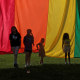 Children hold the rainbow flag during an LGBTQ Pride event in Franklin, Tenn., on June 3, 2023.   