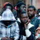 Migrants  outside the Roosevelt Hotel in New York City on Aug. 2, 2023.