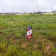 A "For Sale" sign on a vacant lot in the Santa Fe subdivision of the Colony Ridge development in Cleveland, Texas. 