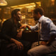 Colman Domingo as Bayard Rustin and Johnny Ramey as Elias sit a bar during a scene in "Rustin"
