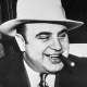 Al Capone on the train which carried him to federal prison.