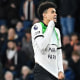 the report news Liverpool's Colombian midfielder Luis Diaz flashes a message on his short after scoring against Luton Town in Luton, north of London, on Nov. 5, 2023.