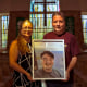 Rosa Elena Martinez and Jaime Mejia hold a photo of their son Sebastian Mejia who died of carbon monoxide poisoning in an Airbnb-rented Rio de Janeiro apartment.